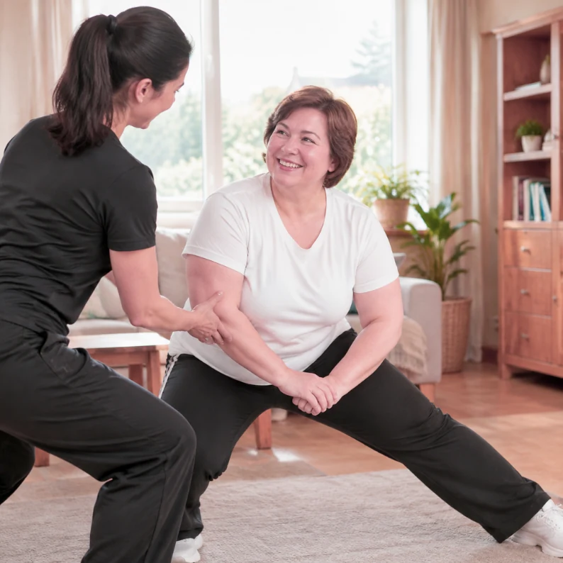 Personal trainer coaching a client through a strength exercise at home
